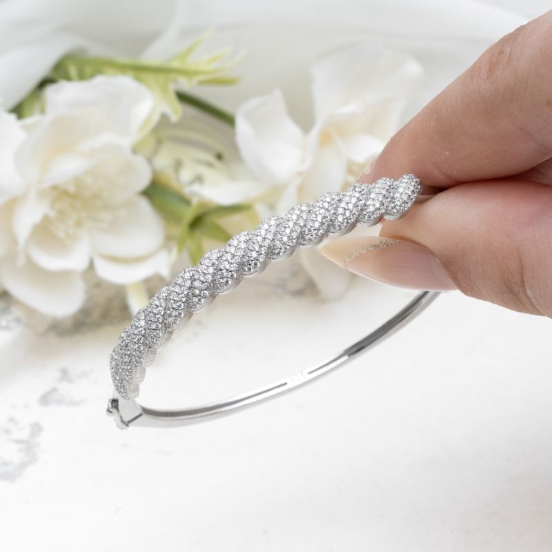 Twist Glow Silver Bangle