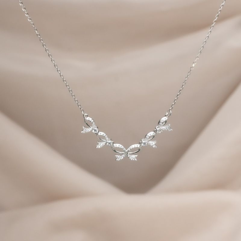 Delicate Bows Silver Necklace